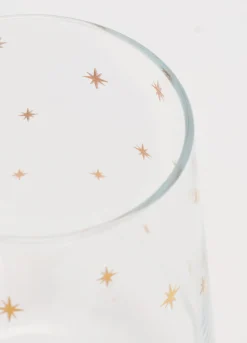 Bicchiere con stelle dorate