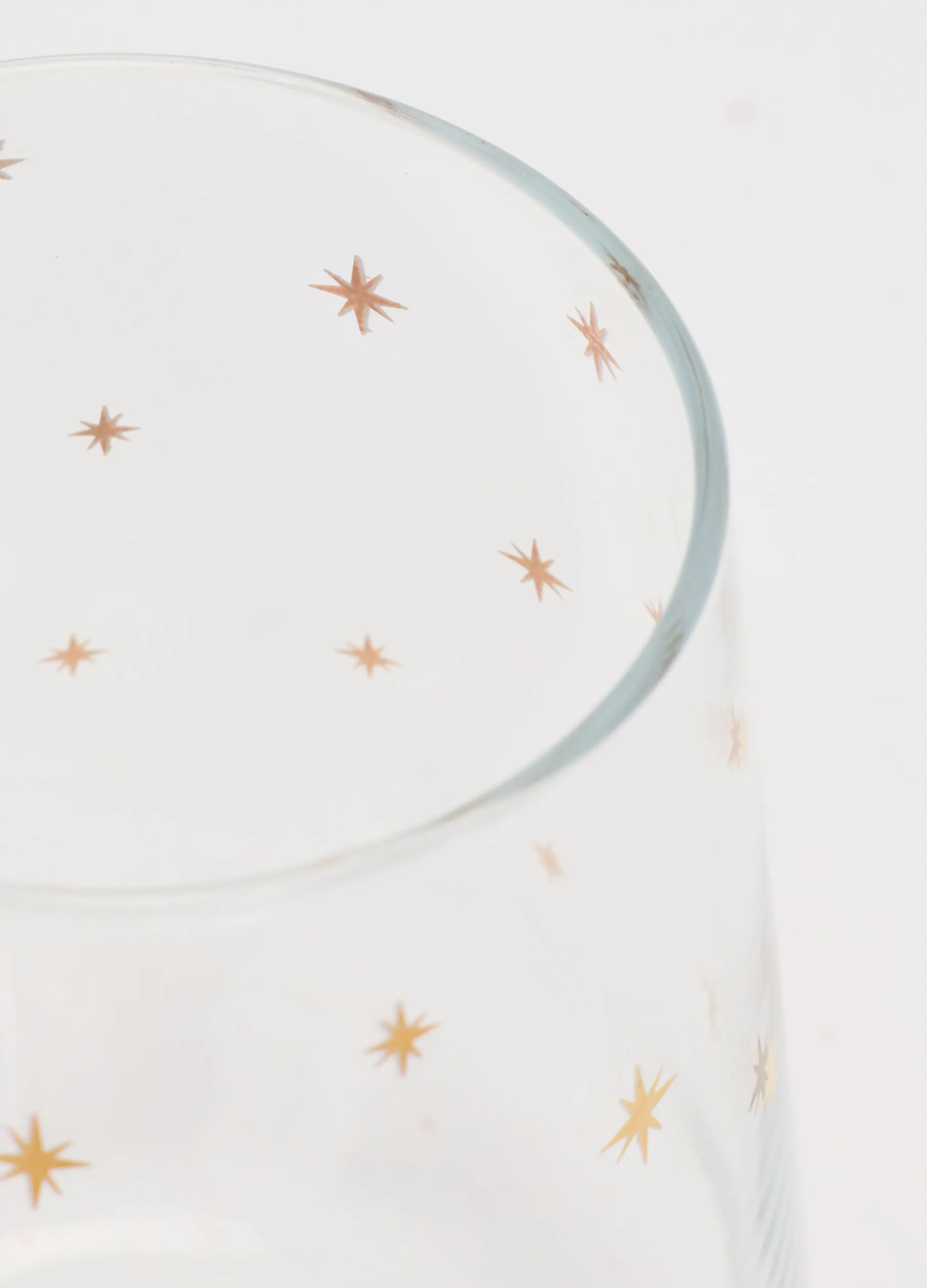Bicchiere con stelle dorate