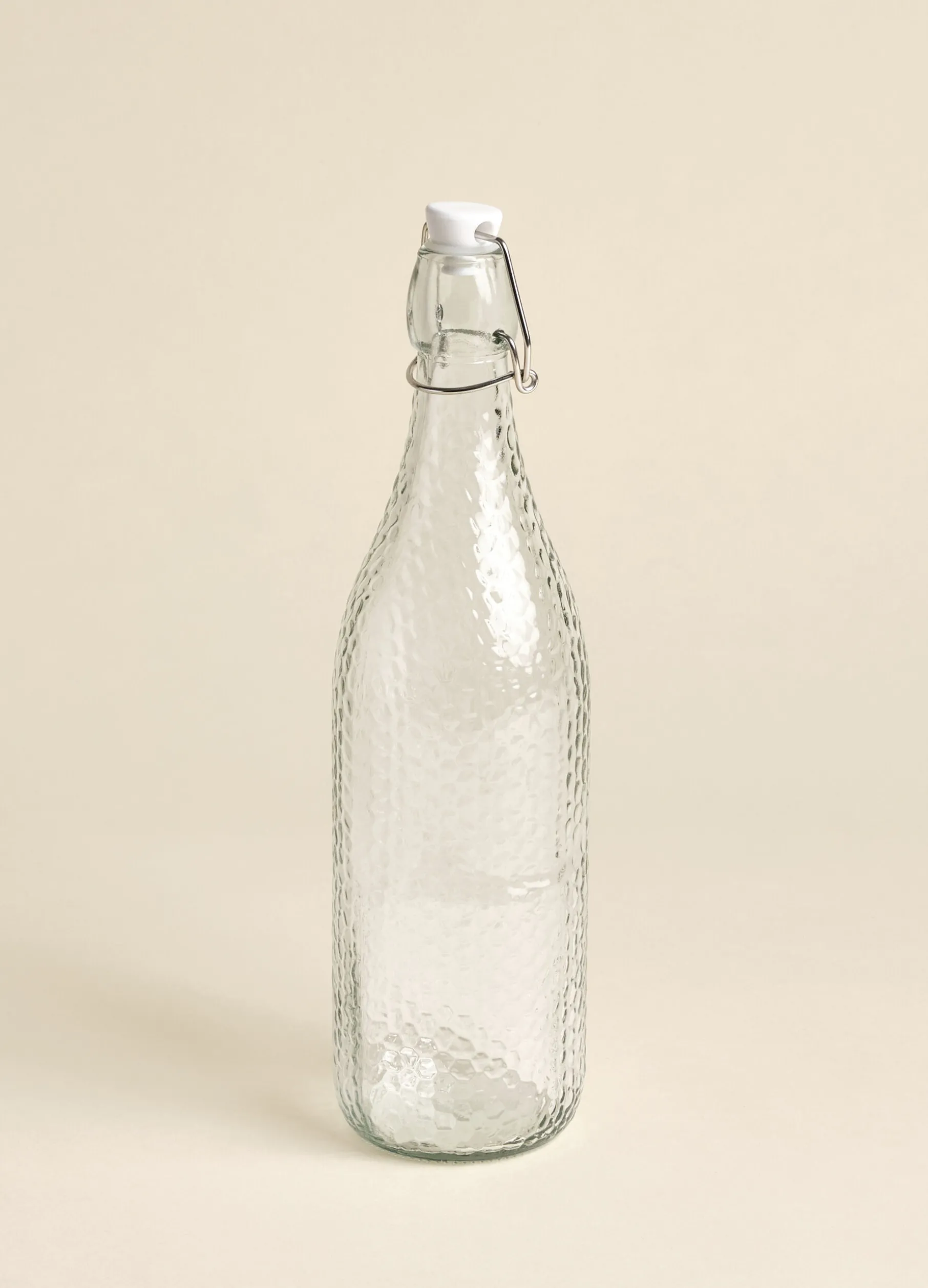 Bottiglia in vetro martellato