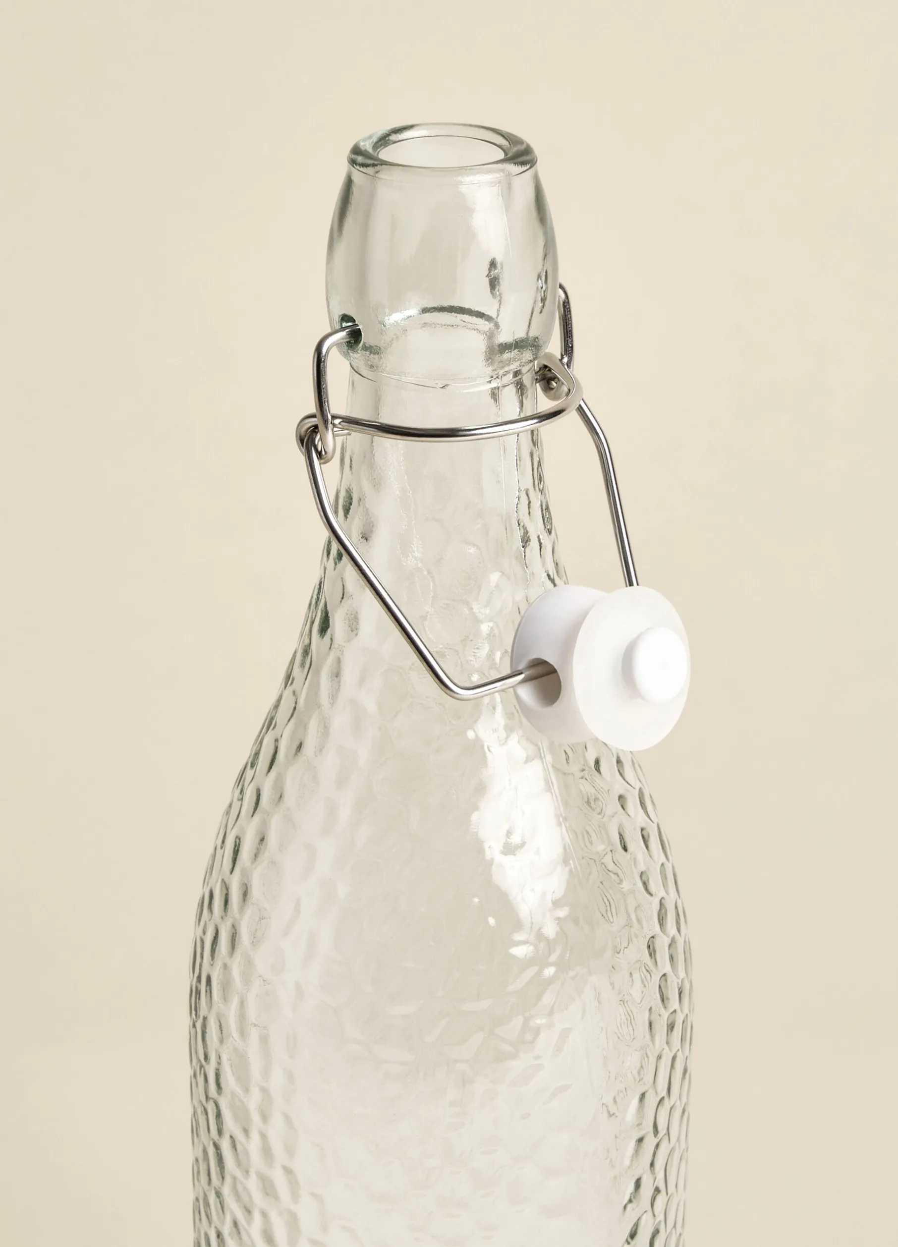 Bottiglia in vetro martellato