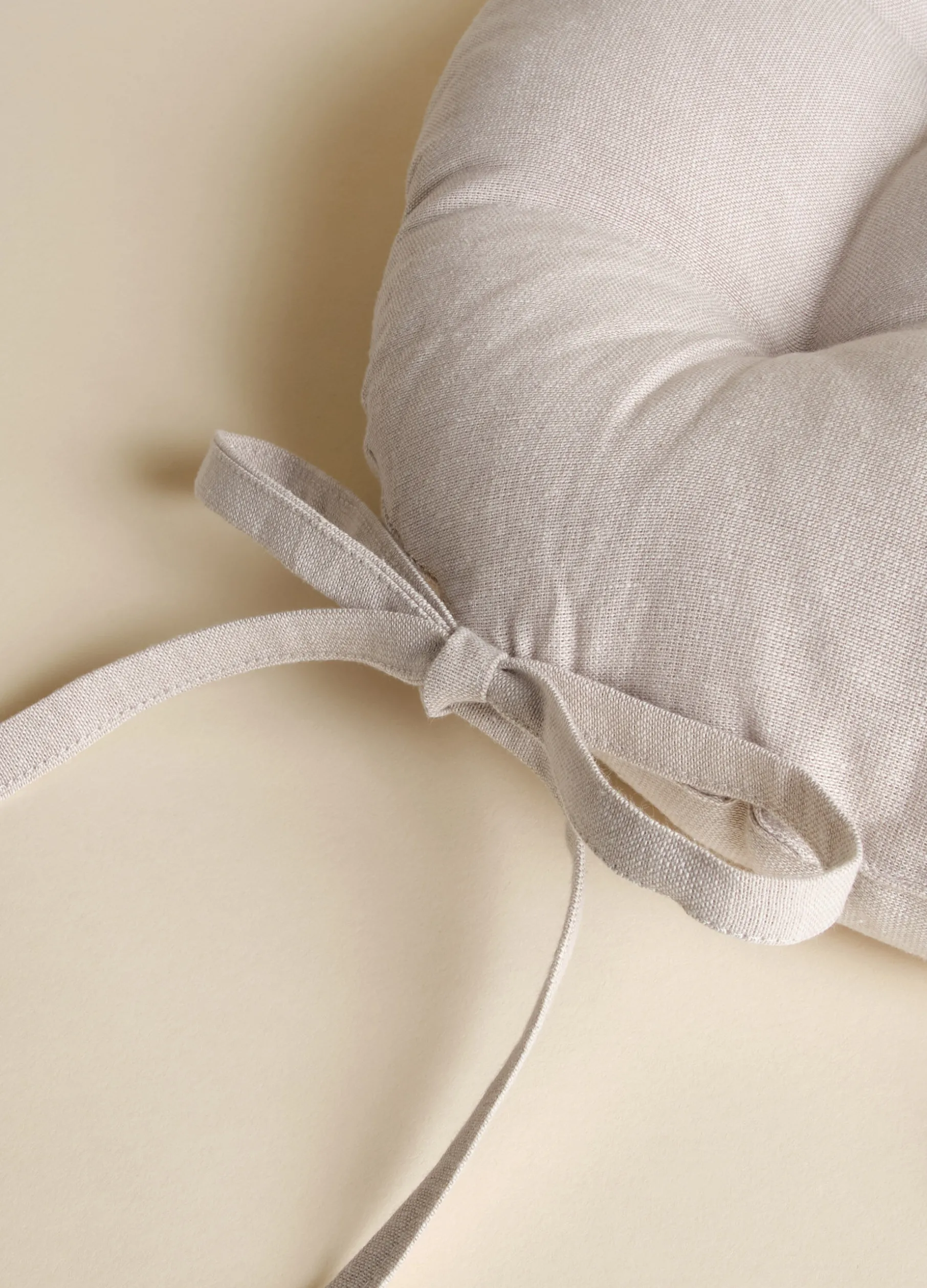 Cuscino coprisedia rotondo trapuntato