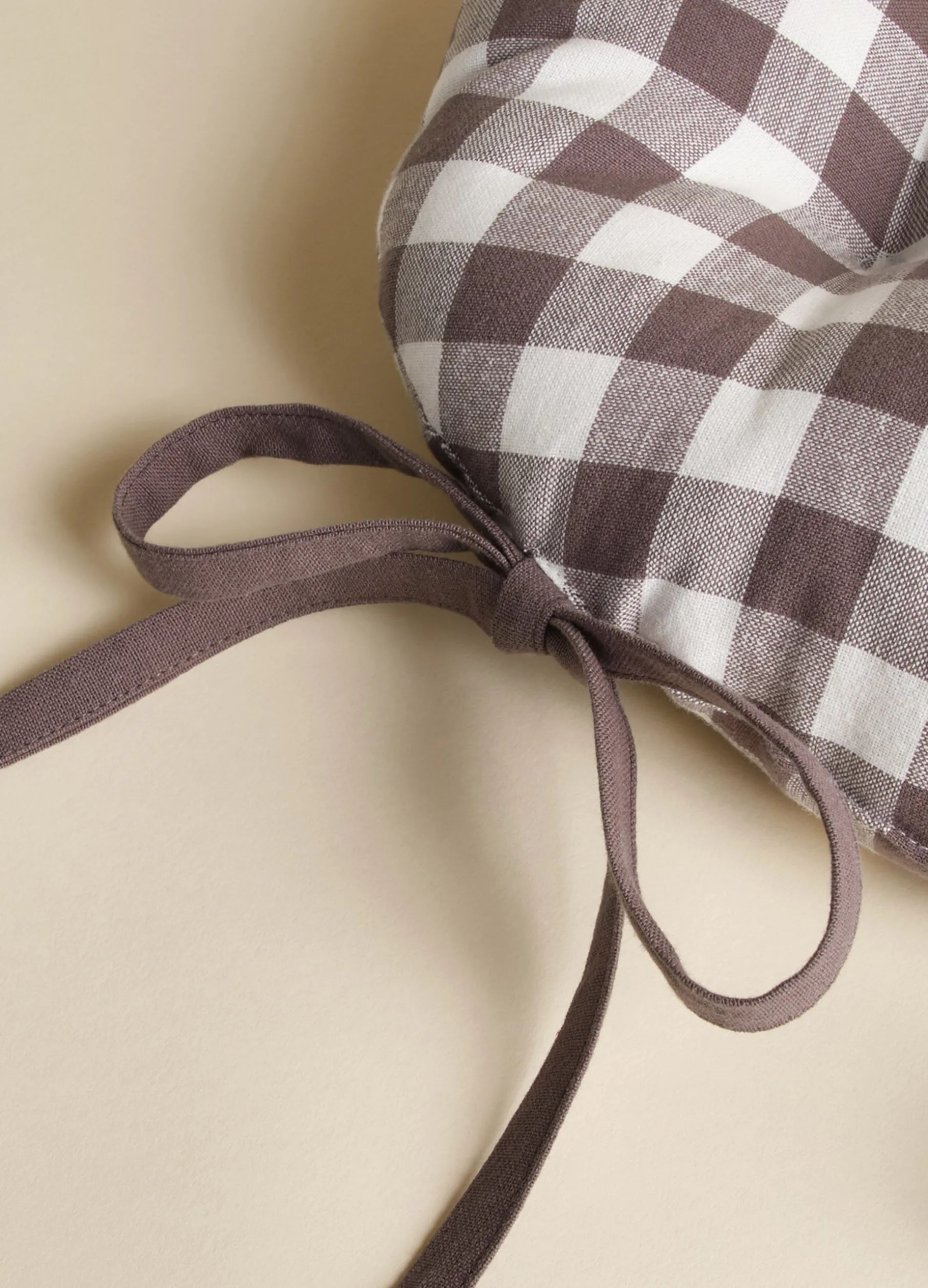 Cuscino coprisedia rotondo a quadretti