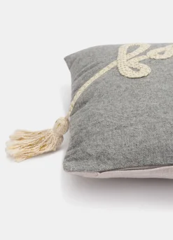 Cuscino rettangolare con nappe