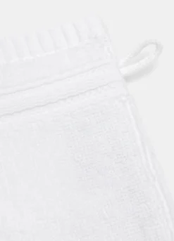 Guanto esfoliante di puro cotone in tinta unita