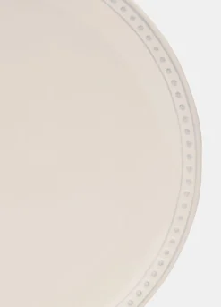 Piatto piano in ceramica con bordo