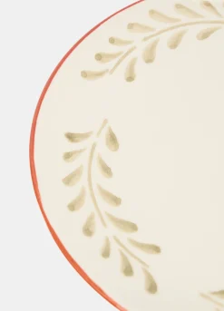 Piatto piano in ceramica con fiore