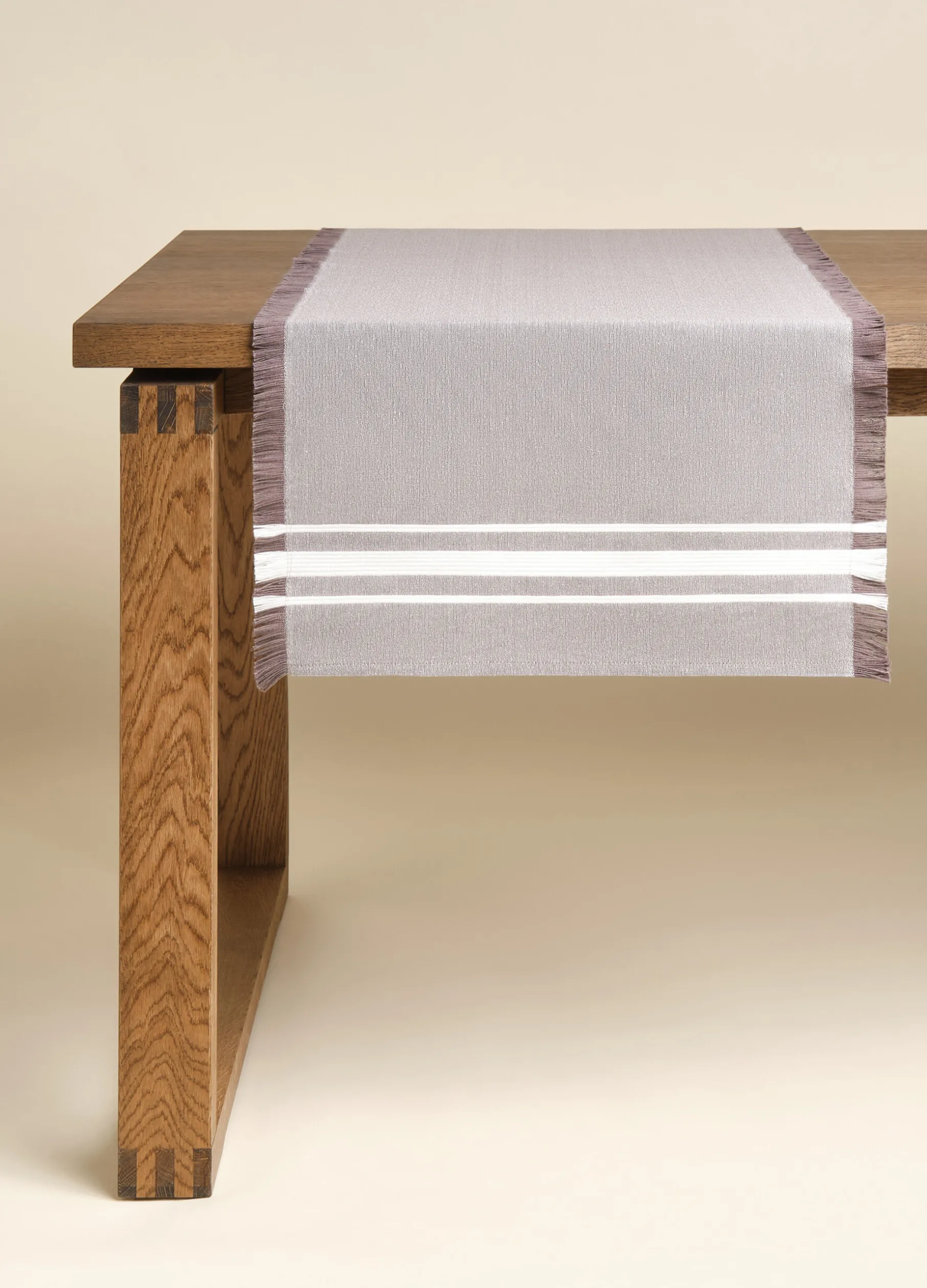 Runner in cotone con frange