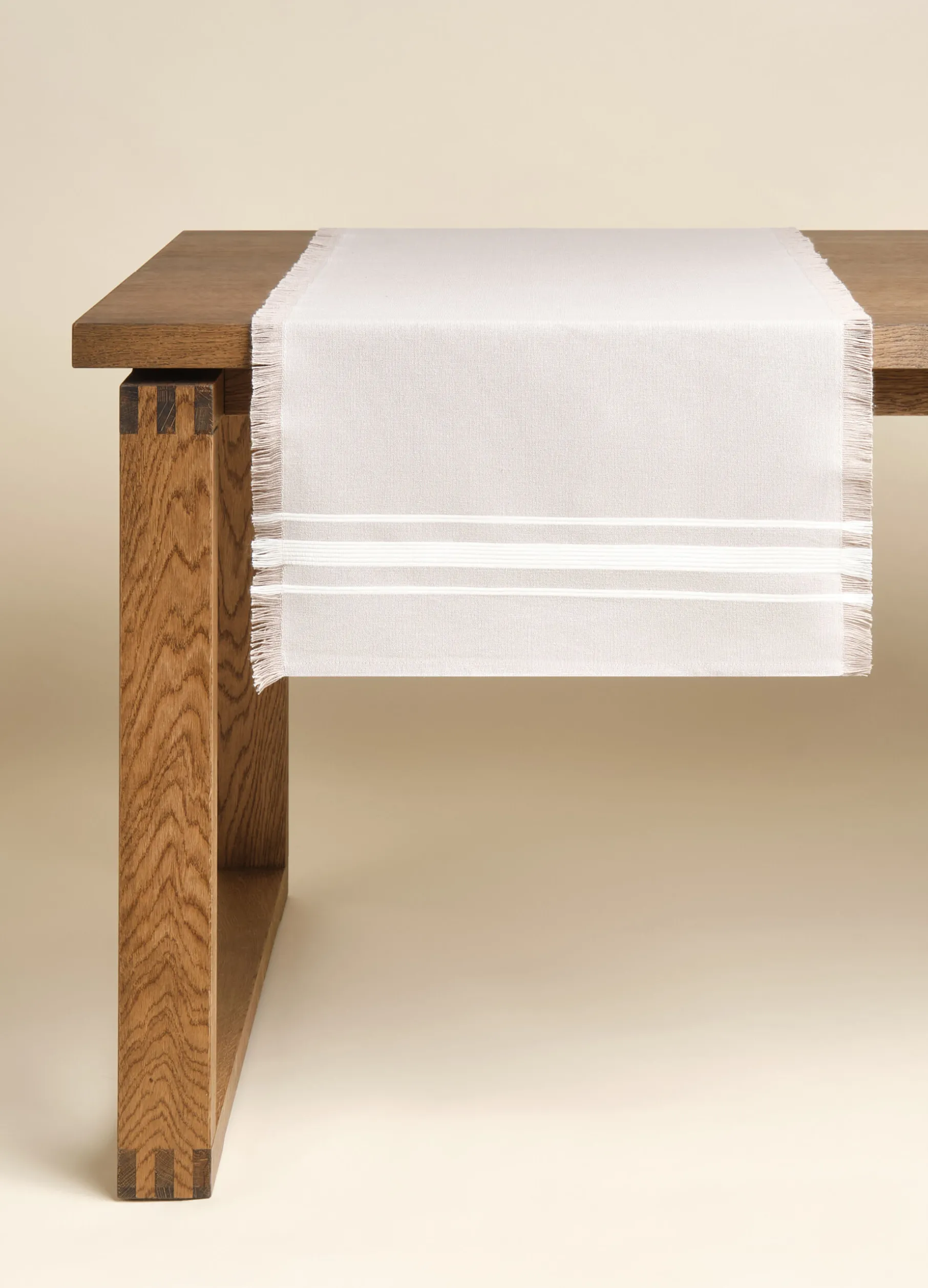 Runner in cotone con frange