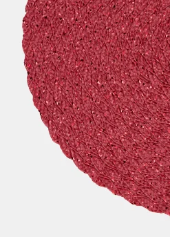 Tovaglietta rotonda intrecciata con dettagli lucidi