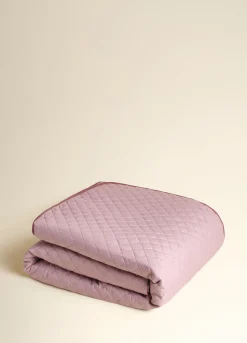 Trapunta a 2 piazze con orlo a contrasto